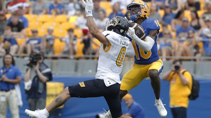 Pittsburgh Panthers defensive back Ryland Gandy (10) breaks up a pass intended for Kent State Golden Flashes wide receiver Luke Floriea (0) during the second quarter at Acrisure Stadium.