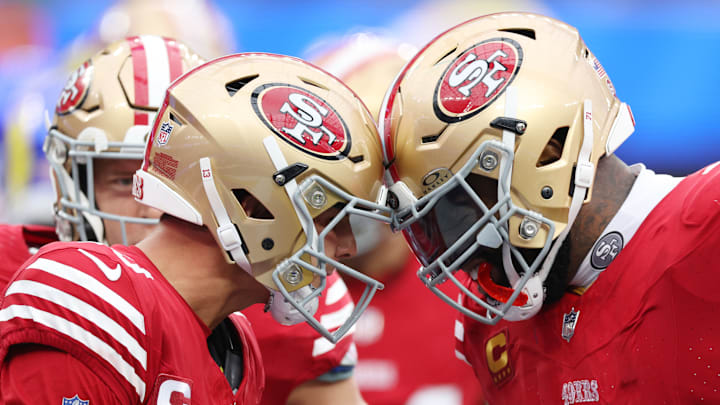 San Francisco 49ers quarterback Brock Purdy (L) and right tackle Trent Williams (R)