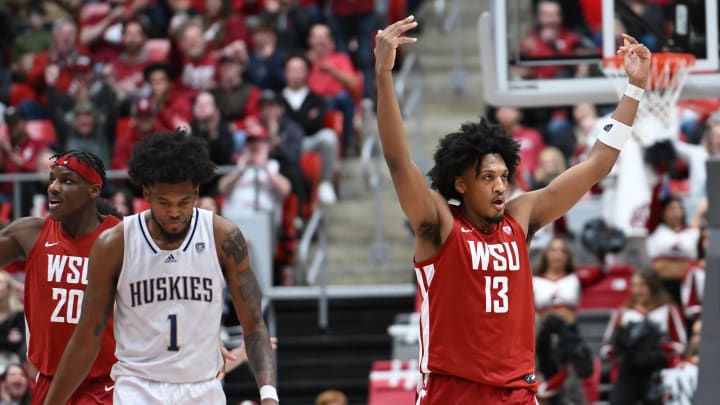 Mar 7, 2024; Pullman, Washington, USA; Washington State Cougars forward Isaac Jones (13) celebrates after a basket against the Washington Huskies in the second half at Friel Court at Beasley Coliseum. Washington Huskies won 74-68. Mandatory Credit: James Snook-USA TODAY Sports