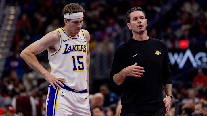 Los Angeles Lakers guard Austin Reaves and head coach JJ Redick.