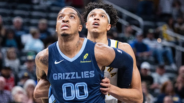 Oct 14, 2024; Indianapolis, Indiana, USA; Memphis Grizzlies forward Armando Bacot (00) boxes out Indiana Pacers forward Enrique Freeman (8) in the second half at Gainbridge Fieldhouse. Mandatory Credit: Trevor Ruszkowski-Imagn Images