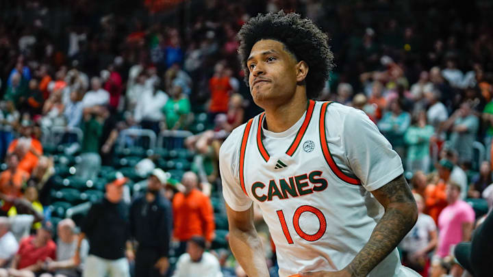 Mar 7, 2026; Coral Gables, Florida, USA; Miami Hurricanes guard Tru Washington (10) reacts after missing a three-point basket to tie the game against the Louisville Cardinals during the second half at Watsco Center. Mandatory Credit: Jeff Romance-Imagn Images