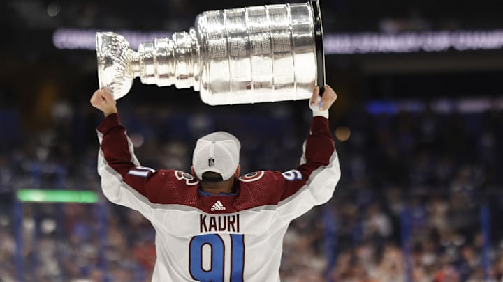 Jun 26, 2022; Tampa, Florida, USA; Colorado Avalanche center Nazem Kadri (91) celebrates with the Stanley Cup after the Avalanche game against the Tampa Bay Lightning in game six of the 2022 Stanley Cup Final at Amalie Arena. Mandatory Credit: Geoff Burke-Imagn Images
