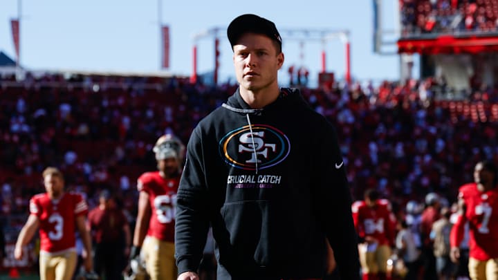 Sep 29, 2024; Santa Clara, California, USA; San Francisco 49ers running back Christian McCaffrey (23) walks off the field after the game against the New England Patriots at Levi's Stadium. Mandatory Credit: Sergio Estrada-Imagn Images
