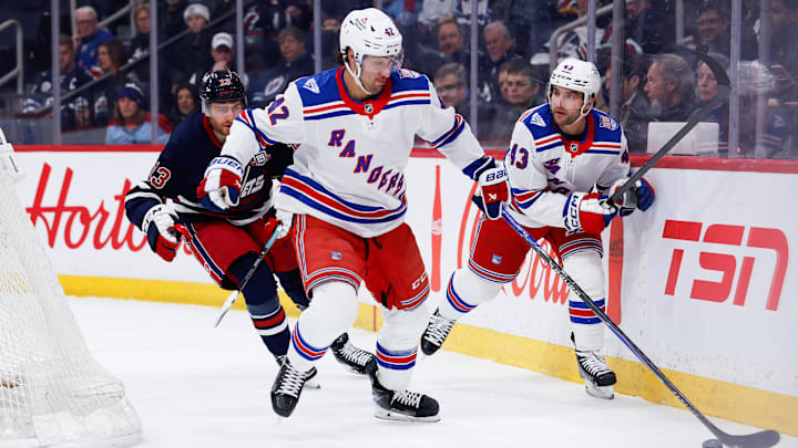 Mar 12, 2026; Winnipeg, Manitoba, CAN; New York Rangers forward Noah Laba (42) skates away from Winnipeg Jets forward Gabriel Vilardi (13) during the first period at Canada Life Centre. Mandatory Credit: Terrence Lee-Imagn Images Mar 12, 2026; Winnipeg, Manitoba, CAN; New York Rangers forward Noah Laba (42) skates away from Winnipeg Jets forward Gabriel Vilardi (13) during the first period at Canada Life Centre. Mandatory Credit: Terrence Lee-Imagn Images