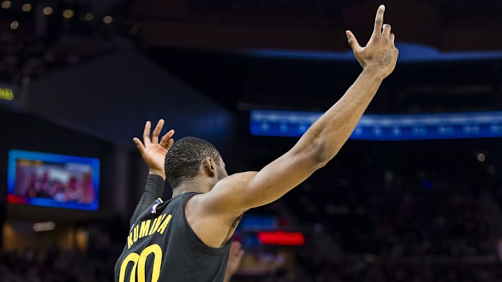 Mar 20, 2025; San Francisco, California, USA; Golden State Warriors forward Jonathan Kuminga (00) reacts after hitting a three-point shot against the Toronto Raptors during the second quarter at Chase Center. Mandatory Credit: John Hefti-Imagn Images
