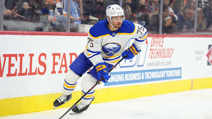 Mar 29, 2025; Philadelphia, Pennsylvania, USA; Buffalo Sabres defenseman Connor Clifton (75) controls the puck against the Philadelphia Flyers in the second period at Wells Fargo Center. Mandatory Credit: Kyle Ross-Imagn Images