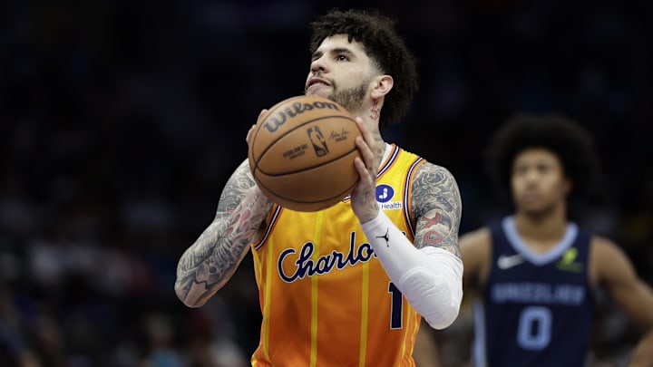 Mar 21, 2026; Charlotte, North Carolina, USA; Charlotte Hornets guard LaMelo Ball (1) takes a technical foul free throw during the second half against the Memphis Grizzlies at Spectrum Center. Mandatory Credit: Brian Westerholt-Imagn Images