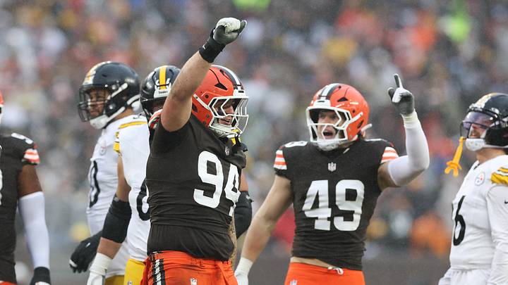 Dec 28, 2025; Cleveland, Ohio, USA; Cleveland Browns defensive tackle Mason Graham (94) and linebacker Carson Schwesinger (49) celebrate in the second quarter against the Pittsburgh Steelers at Huntington Bank Field. Mandatory Credit: Scott Galvin-Imagn Images