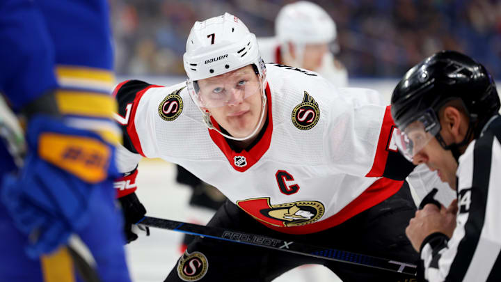 Mar 27, 2024; Buffalo, New York, USA;  Ottawa Senators left wing Brady Tkachuk (7) waits for the face-off during the second period against the Buffalo Sabres at KeyBank Center. Mandatory Credit: Timothy T. Ludwig-USA TODAY Sports