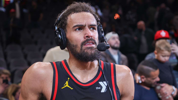 Atlanta Hawks guard Trae Young (11) does an interview after a victory over the Indiana Pacers at State Farm Arena. Atlanta Hawks guard Trae Young (11) does an interview after a victory over the Indiana Pacers at State Farm Arena.