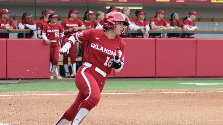 Oklahoma outfielder Abby Dayton hustles toward first against Kentucky at Love's Field.