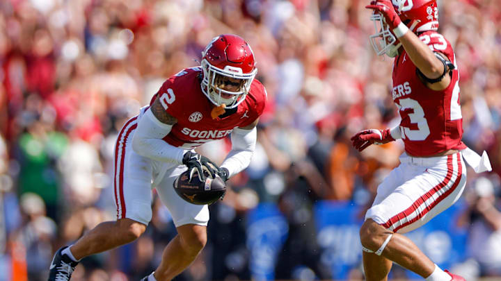 Oct 12, 2024; Dallas, Texas, USA; Oklahoma Sooners defensive back Billy Bowman Jr. (2) intercepts a pass during the first quarter against the Texas Longhorns at the Cotton Bowl. Mandatory Credit: Andrew Dieb-Imagn Images