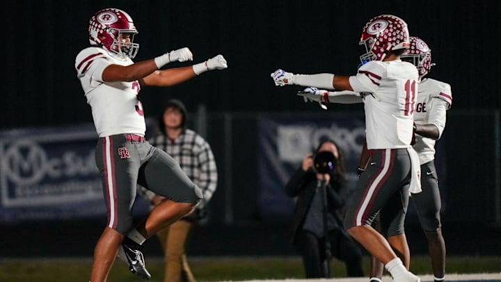 Oak Ridge's Malik Howard (3) and Oak Ridge's Adam Washington (11) celebrate after a touchdown during a TSSAA high school football game between Farragut and Oak Ridge High School in Knoxville, Tenn., on Oct. 23, 2025.