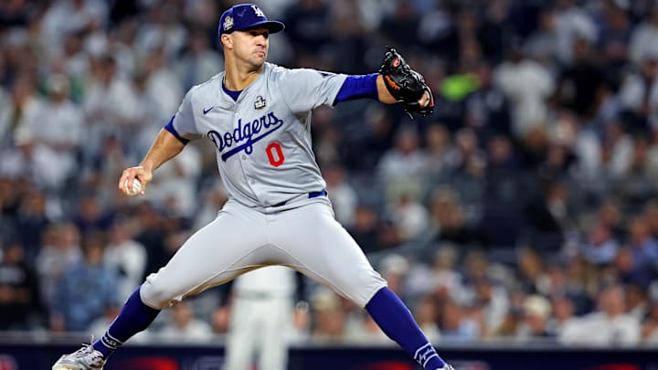 Oct 30, 2024; New York, New York, USA; Los Angeles Dodgers pitcher Jack Flaherty (0) pitches during the first inning against the New York Yankees in game four of the 2024 MLB World Series at Yankee Stadium. 