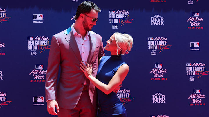 Jul 15, 2025; Atlanta, GA, USA; National League pitcher Paul Skenes (30) of the Pittsburgh Pirates and social media influencer Livvy Dunne pose for a photo on the red carpet before the 2025 MLB All Star Game at Truist Park. Mandatory Credit: Brett Davis-Imagn Images