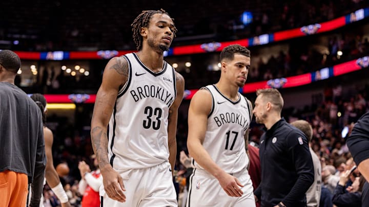 Jan 14, 2026; New Orleans, Louisiana, USA;  Brooklyn Nets forward Michael Porter Jr. (17) and center Nic Claxton (33) head to the locker room after the game against the New Orleans Pelicans at Smoothie King Center. Mandatory Credit: Stephen Lew-Imagn Images