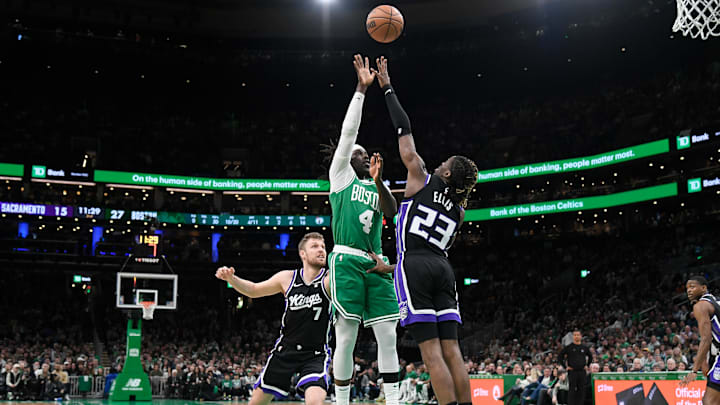Apr 5, 2024; Boston, Massachusetts, USA; Boston Celtics guard Jrue Holiday (4) shoots the ball over Sacramento Kings guard Keon Ellis (23) during the first half at TD Garden. Mandatory Credit: Eric Canha-Imagn Images Apr 5, 2024; Boston, Massachusetts, USA; Boston Celtics guard Jrue Holiday (4) shoots the ball over Sacramento Kings guard Keon Ellis (23) during the first half at TD Garden. Mandatory Credit: Eric Canha-Imagn Images