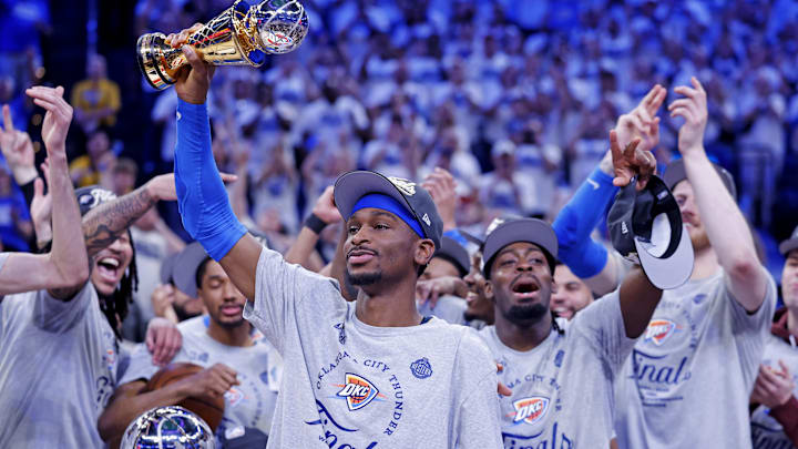 May 28, 2025; Oklahoma City, Oklahoma, USA; Oklahoma City Thunder guard Shai Gilgeous-Alexander (2) celebrates with Magic Johnson West Conference Finals MVP trophy after defeating the Minnesota Timberwolves in game five to win the western conference finals for the 2025 NBA Playoffs at Paycom Center. Mandatory Credit: Alonzo Adams-Imagn Images May 28, 2025; Oklahoma City, Oklahoma, USA; Oklahoma City Thunder guard Shai Gilgeous-Alexander (2) celebrates with Magic Johnson West Conference Finals MVP trophy after defeating the Minnesota Timberwolves in game five to win the western conference finals for the 2025 NBA Playoffs at Paycom Center. Mandatory Credit: Alonzo Adams-Imagn Images
