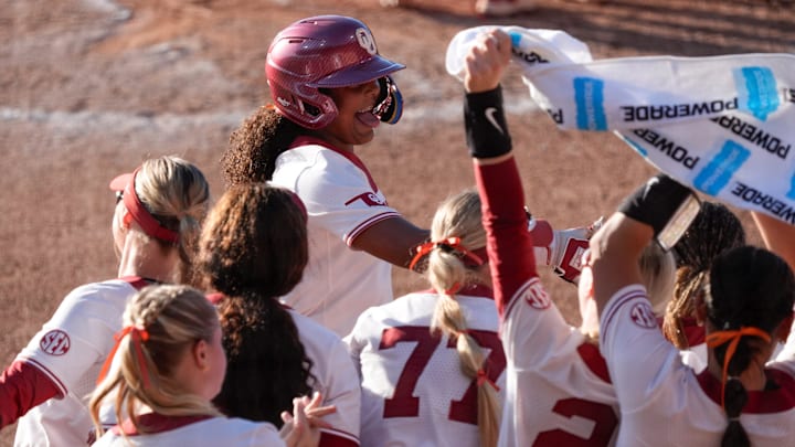 Oklahoma's Corri Hicks celebrates after hitting a home run in the Norman Regional.