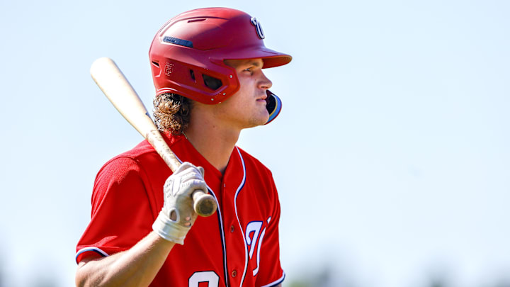 Feb 20, 2023; West Palm Beach, FL, USA; Washington Nationals infielder Brady House (9) looks on during a spring training workout at The Ballpark of the Palm Beaches. Feb 20, 2023; West Palm Beach, FL, USA; Washington Nationals infielder Brady House (9) looks on during a spring training workout at The Ballpark of the Palm Beaches.