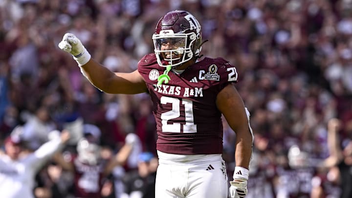 Dec 20, 2025; College Station, TX, USA; Texas A&M Aggies linebacker Taurean York (21) celebrates during the game between the Aggies and the Hurricanes at Kyle Field. Mandatory Credit: Jerome Miron-Imagn Images
