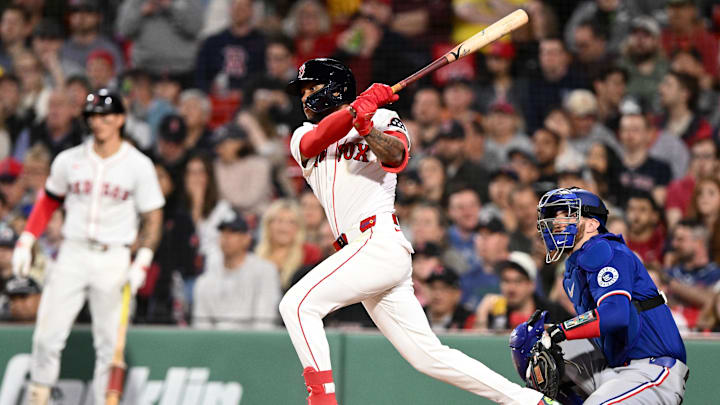 May 7, 2025; Boston, Massachusetts, USA; Boston Red Sox center fielder Ceddanne Rafaela (3) hits a single against the Texas Rangers during the seventh inning at Fenway Park. Mandatory Credit: Brian Fluharty-Imagn Images