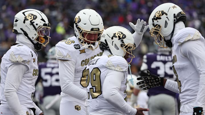 Manhattan, Kansas, USA; Colorado Buffaloes running back Micah Welch (29) is congratulated by teammates after scoring a touchdown in the fourth quarter against the Kansas State Wildcats at Bill Snyder Family Football Stadium. Manhattan, Kansas, USA; Colorado Buffaloes running back Micah Welch (29) is congratulated by teammates after scoring a touchdown in the fourth quarter against the Kansas State Wildcats at Bill Snyder Family Football Stadium.