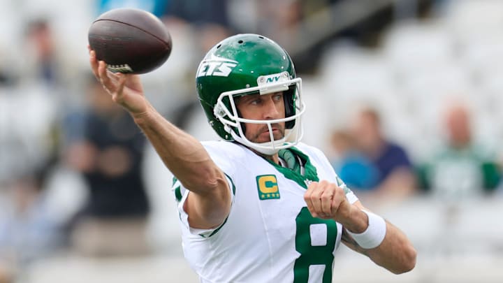 New York Jets quarterback Aaron Rodgers (8) warms up before an NFL football matchup Sunday, Dec. 15, 2024 at EverBank Stadium in Jacksonville, Fla. [Corey Perrine/Florida Times-Union]