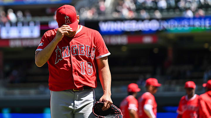 Apr 26, 2025; Minneapolis, Minnesota, USA; Los Angeles Angels pitcher Yusei Kikuchi (16) walks off the mound after being taken out of the game during the third inning against the Minnesota Twins at Target Field. Mandatory Credit: Jeffrey Becker-Imagn Images