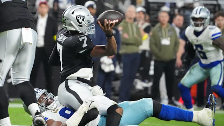 Nov 17, 2025; Paradise, Nevada, USA; Dallas Cowboys defensive tackle Osa Odighizuwa (97) pressures Las Vegas Raiders quarterback Geno Smith (7) during the second half at Allegiant Stadium. Mandatory Credit: Kirby Lee-Imagn Images Nov 17, 2025; Paradise, Nevada, USA; Dallas Cowboys defensive tackle Osa Odighizuwa (97) pressures Las Vegas Raiders quarterback Geno Smith (7) during the second half at Allegiant Stadium. Mandatory Credit: Kirby Lee-Imagn Images
