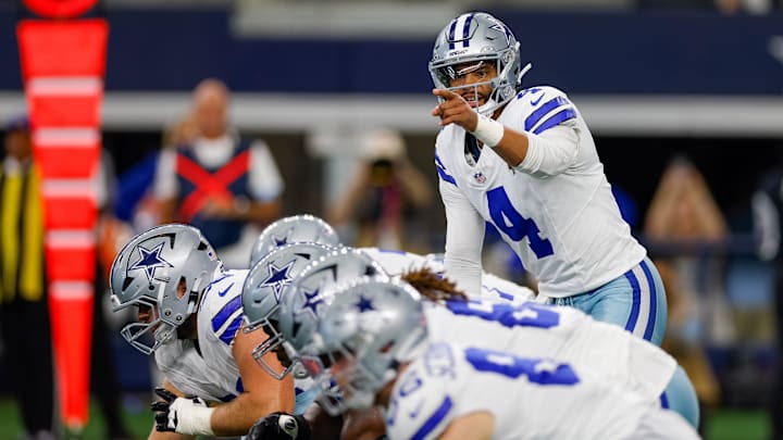 Sep 22, 2024; Arlington, Texas, USA; Dallas Cowboys quarterback Dak Prescott (4) sets up at the line of scrimmage during the first quarter against the Baltimore Ravens at AT&T Stadium. Mandatory Credit: Andrew Dieb-Imagn Images Sep 22, 2024; Arlington, Texas, USA; Dallas Cowboys quarterback Dak Prescott (4) sets up at the line of scrimmage during the first quarter against the Baltimore Ravens at AT&T Stadium. Mandatory Credit: Andrew Dieb-Imagn Images