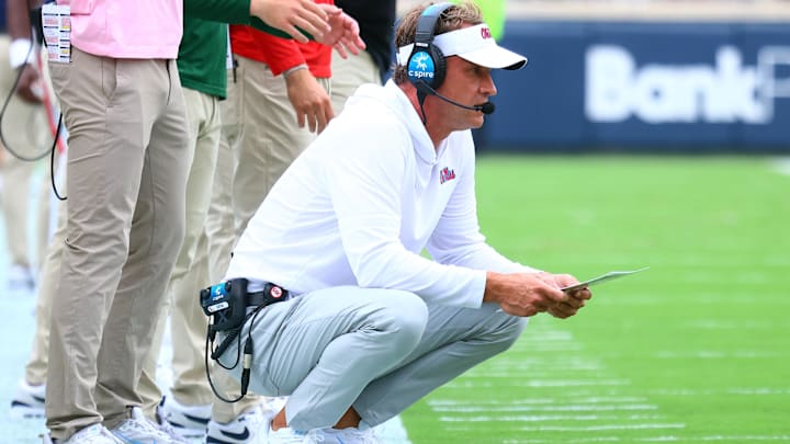 Sep 20, 2025; Oxford, Mississippi, USA; Mississippi Rebels head coach Lane Kiffin looks on during the first quarter against the Tulane Green Wave at Vaught-Hemingway Stadium. Mandatory Credit: Petre Thomas-Imagn Images