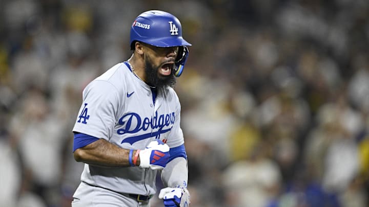 Oct 8, 2024; San Diego, California, USA; Los Angeles Dodgers outfielder Teoscar Hernandez (37) celebrates after hitting a grand slam in the third inning against the San Diego Padres during game three of the NLDS for the 2024 MLB Playoffs at Petco Park.  Mandatory Credit: Denis Poroy-Imagn Images
