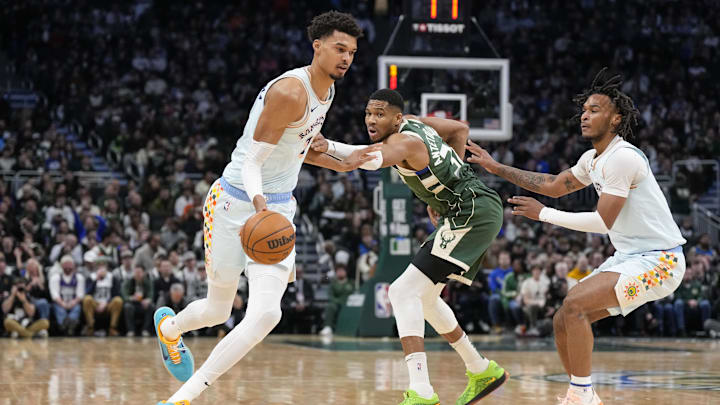 Jan 8, 2025; Milwaukee, Wisconsin, USA; San Antonio Spurs forward Victor Wembanyama (1) drives towards the basket around Milwaukee Bucks forward Giannis Antetokounmpo (34) during the first quarter at Fiserv Forum. Mandatory Credit: Jeff Hanisch-Imagn Images Jan 8, 2025; Milwaukee, Wisconsin, USA; San Antonio Spurs forward Victor Wembanyama (1) drives towards the basket around Milwaukee Bucks forward Giannis Antetokounmpo (34) during the first quarter at Fiserv Forum. Mandatory Credit: Jeff Hanisch-Imagn Images