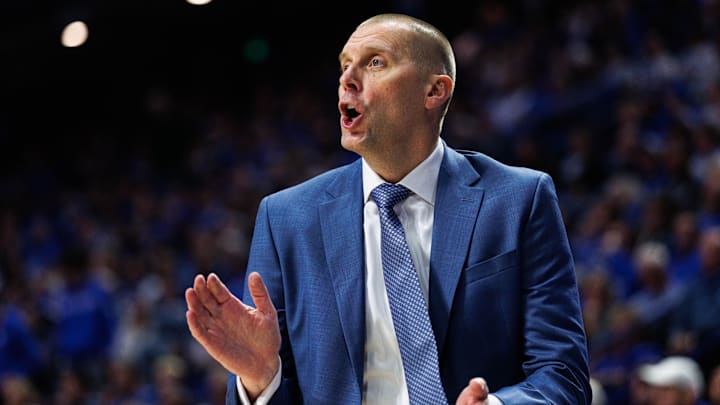 Nov 21, 2025; Lexington, Kentucky, USA; Kentucky Wildcats head coach Mark Pope talks with his players on the court during the first half against the Loyola (MD) Greyhounds at Rupp Arena at Central Bank Center. Mandatory Credit: Jordan Prather-Imagn Images