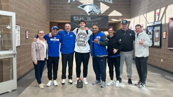 BYU commit Brock Harris with the BYU coaching staff