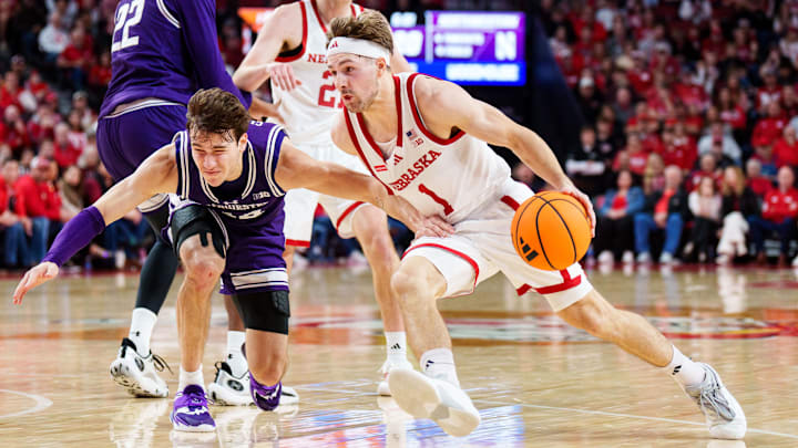 Nebraska Cornhuskers guard Sam Hoiberg drives against Northwestern Wildcats guard Angelo Ciaravino.