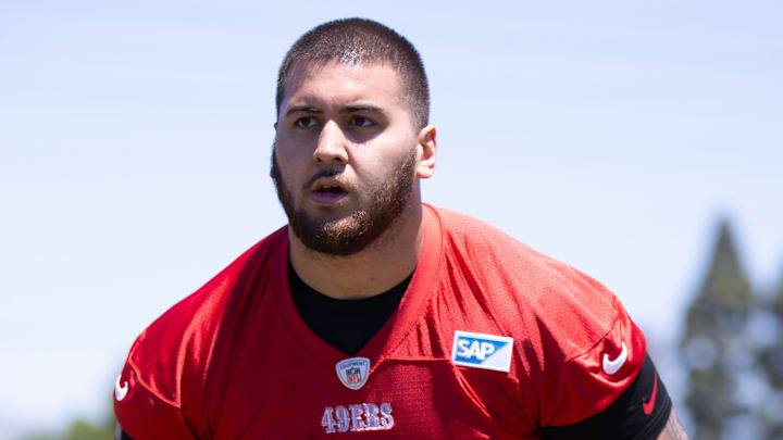 San Francisco 49ers offensive lineman Dominick Puni (77)