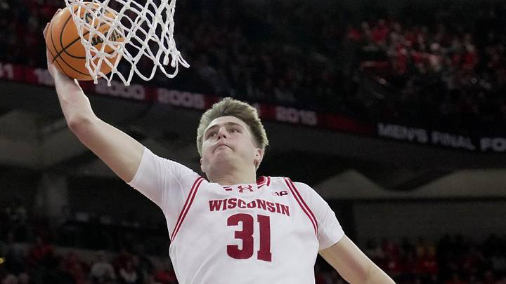 Wisconsin forward Nolan Winter (31) misses a dunk during the second half of the game Sunday, February 22, 2026 at the Kohl Center in Madison, Wisconsin. Wisconsin beat Iowa 84-71.