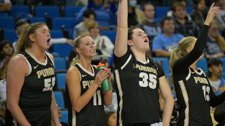 The Purdue Boilermakers react after a basket. The Purdue Boilermakers react after a basket.