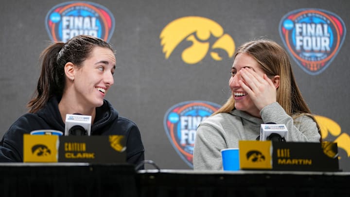 Iowa Hawkeyes guard Caitlin Clark (22) and Iowa Hawkeyes guard Kate Martin (20) take questions at Rocket Mortgage Arena, Thursday, April 4, 2024 in Cleveland. Iowa Hawkeyes guard Caitlin Clark (22) and Iowa Hawkeyes guard Kate Martin (20) take questions at Rocket Mortgage Arena, Thursday, April 4, 2024 in Cleveland.