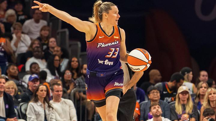 Aug 30, 2025; Phoenix, Arizona, USA; Phoenix Mercury guard Sami Whitcomb (33) calls out a play as she brings the ball down the court in the first half against the New York Liberty at Footprint Center. Mandatory Credit: Allan Henry-Imagn Images
