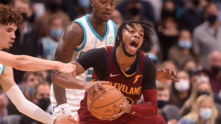 Nov 1, 2021; Charlotte, North Carolina, USA;  Cleveland Cavaliers guard Darius Garland (10) gets fouled by Charlotte Hornets guard LaMelo Ball (2) during the second half at the Spectrum Center. Mandatory Credit: Sam Sharpe-Imagn Images