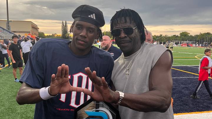 Columbus athlete and Miami commit A'mir Sears with former University of Miami star and Pro Football Hall of Famer Michael Irvin at St. Thomas Aquinas on Aug. 29, 2026.