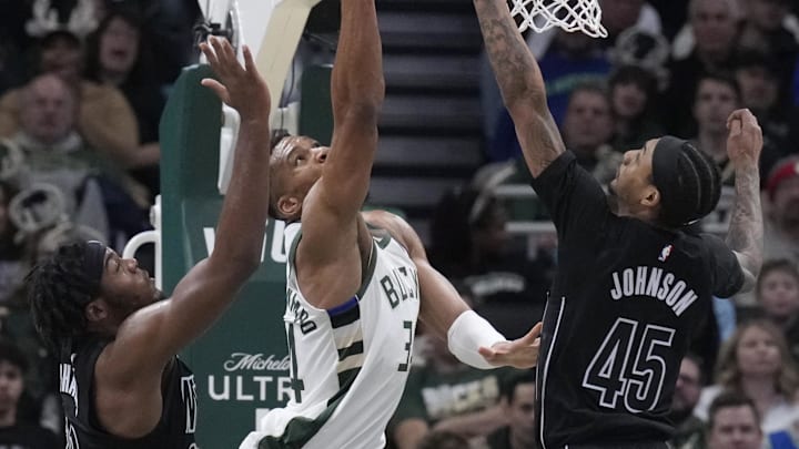 Jan 2, 2025; Milwaukee, Wisconsin, USA; Milwaukee Bucks forward Giannis Antetokounmpo (34) put up a shot against Brooklyn Nets guard Keon Johnson (45) in the second half at Fiserv Forum. Mandatory Credit: Michael McLoone-Imagn Images Jan 2, 2025; Milwaukee, Wisconsin, USA; Milwaukee Bucks forward Giannis Antetokounmpo (34) put up a shot against Brooklyn Nets guard Keon Johnson (45) in the second half at Fiserv Forum. Mandatory Credit: Michael McLoone-Imagn Images
