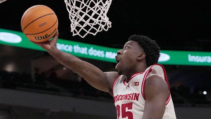Wisconsin guard John Blackwell (25) scores during the second half of their game Friday, December 19, 2025 at Fiserv Forum in Milwaukee, Wisconsin. Villanova beat Wisconsin 76-66 in overtime. Wisconsin guard John Blackwell (25) scores during the second half of their game Friday, December 19, 2025 at Fiserv Forum in Milwaukee, Wisconsin. Villanova beat Wisconsin 76-66 in overtime.