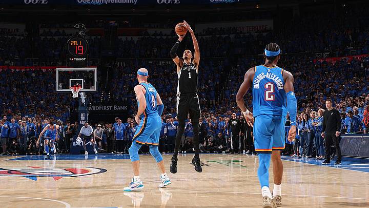 Wembanyama's deep three-point shot tied the game in the first OT. Wembanyama's deep three-point shot tied the game in the first OT.
