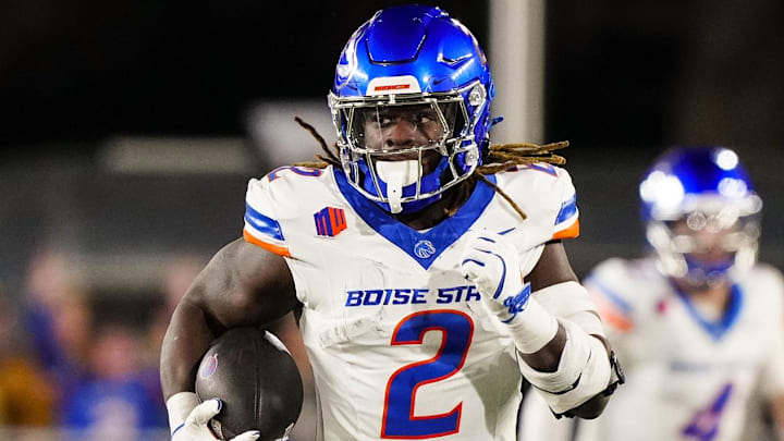Nov 23, 2024; Laramie, Wyoming, USA; Boise State Broncos running back and Heisman Trophy candidate Ashton Jeanty (2) runs for a touchdown against the Wyoming Cowboys during the first quarter at Jonah Field at War Memorial Stadium. Mandatory Credit: Troy Babbitt-Imagn Images

