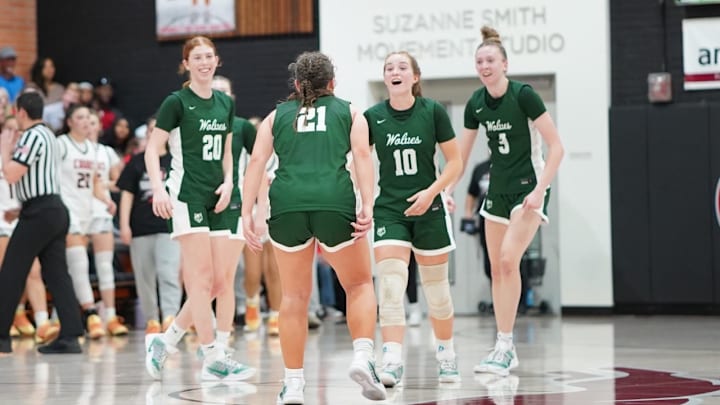 San Ramon Valley High School's girls basketball team finally celebrate in the final 10 seconds of their 51-44 win at Carondelet March 4 in the CIF Northern California Open Division first-round game just four days after being beat by the same Cougars for the North Coast Section Open championship. 